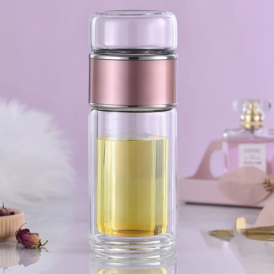 Théière de voyage en verre isolant, design élégant avec couvercle vert, parfaite pour infusions chaudes ou froides